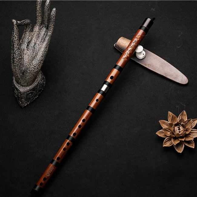 Single Guo Xinming Professional Dizi flute displayed with detailed engravings and rich bamboo tone, ideal for serious musicians and hobbyists.